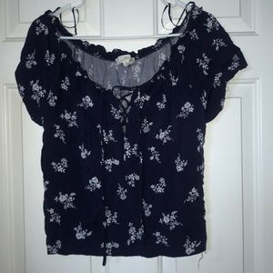 blue and white flower patterned off the shoulder